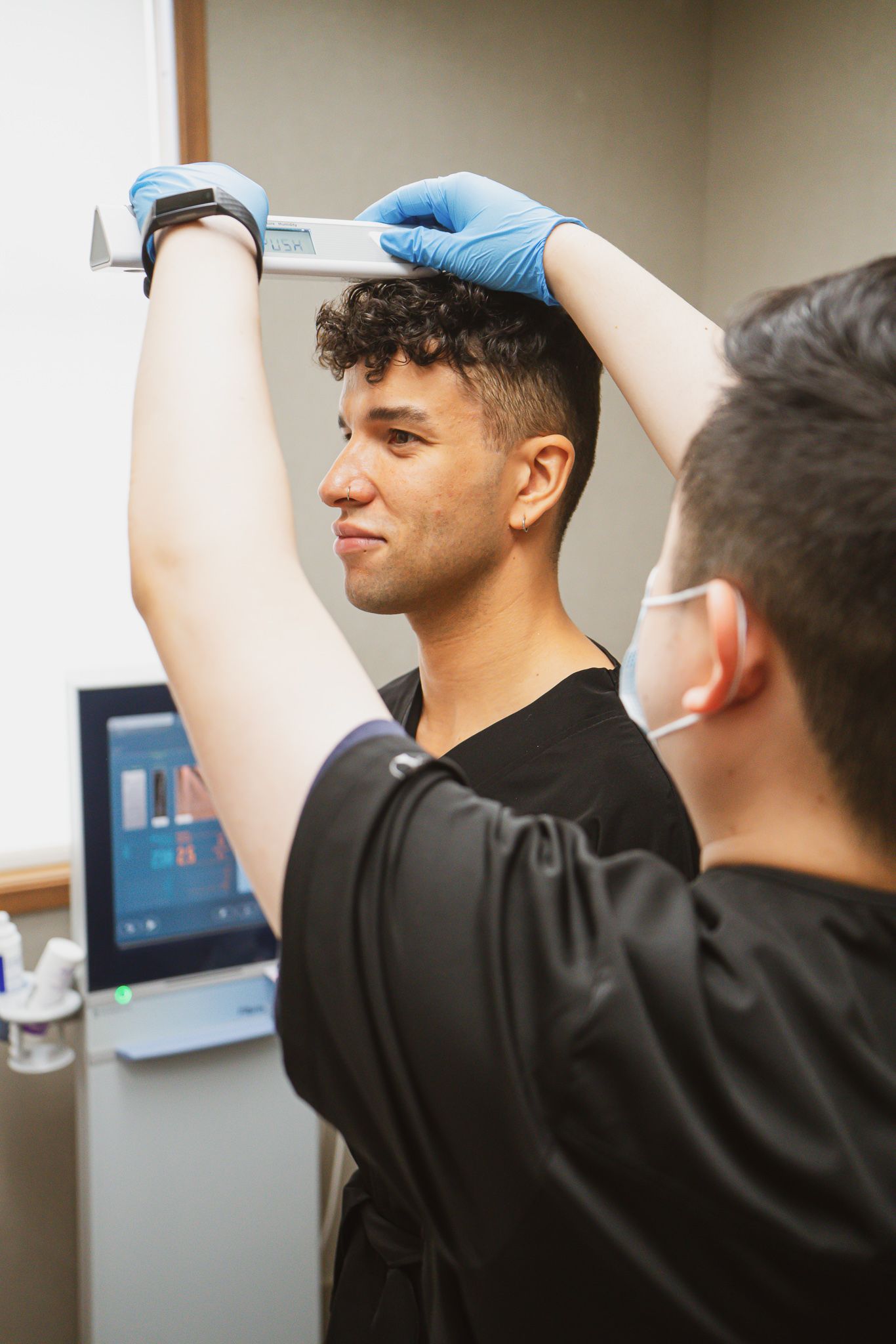 Man receiving a physician-led health assessment